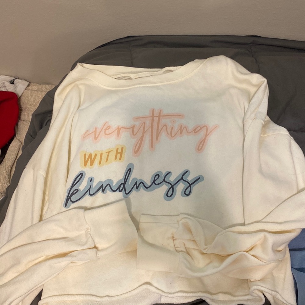 White cropped top with words on it